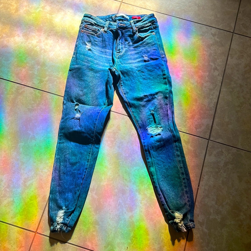 Size 3/26 destroyed denim jeans.